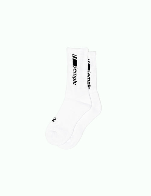 Soft Temple® Sports Socks. Ideal socks for everybody. Put your sneakers on and rock these comfortable soft socks above it. Black "Racer" logo on white cotton. Logo applied on every side of the sock. And a black TT logo on the top/toes. Ribbed cuffs and stretch bands for nice and comfortable fit and feeling. We also have the Temple® Racer Sports Socks in the color black. You can find them in the webshop. Sold as one pair as a one size product.